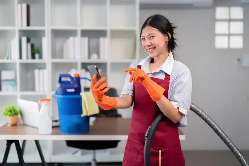 Cleaner making a phone call